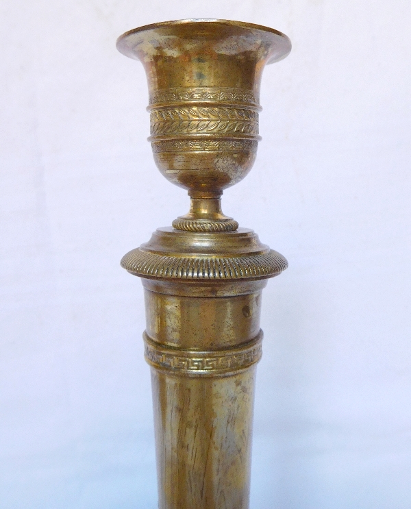 Thomire : bougeoir / flambeau en bronze doré d'époque Empire modèle du château de Fontainebleau