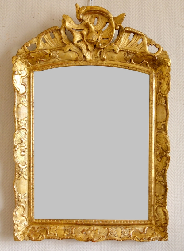 Miroir en bois doré d'époque Régence, glace au mercure - 95cm x 63,5cm