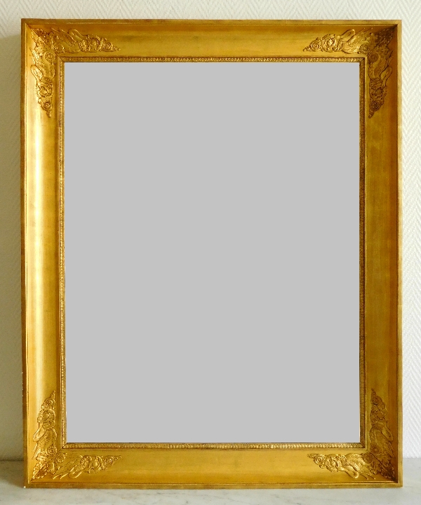 Miroir aux cygnes d'époque Empire Restauration en bois doré - 105cm x 84cm