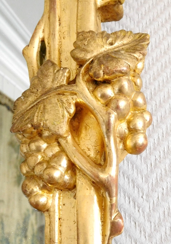 Miroir en bois doré, glace au mercure, travail Provencal d'époque Louis XV - Transition