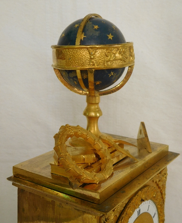 Pendule à l'étude des sciences et de l'astronomie en bronze doré au mercure - époque Empire