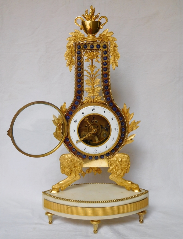 Pendule squelette d'époque Louis XVI Directoire en marbre et bronze doré