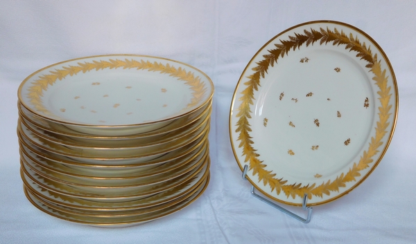 Locré : 12 assiettes en porcelaine d'époque Empire rehaussée à l'or fin