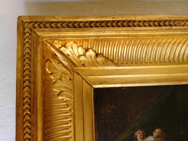 Ecole du XIXe siècle, scène galante d'après Greuze, huile sur panneau dans un cadre en bois doré