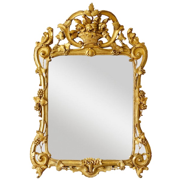 Grand miroir provençal d'époque Louis XV en bois doré richement sculpté, glace au mercure