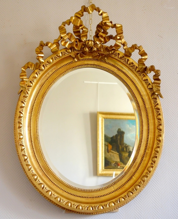 Grand miroir ovale de style Louis XVI en bois doré, époque Napoléon III - 77cm x 104cm