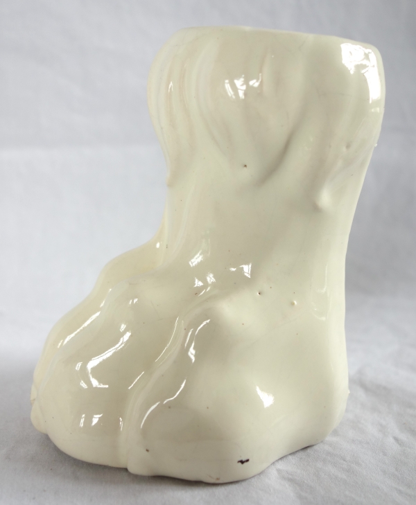 Suite de 4 pieds griffes pour poêle en faïence XIXe