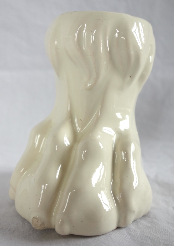 Suite de 4 pieds griffes pour poêle en faïence XIXe