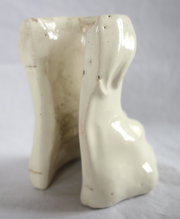 Suite de 4 pieds griffes pour poêle en faïence XIXe