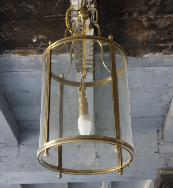 Pair of Louis XVI style lanterns for a vestibule, bronze & glass