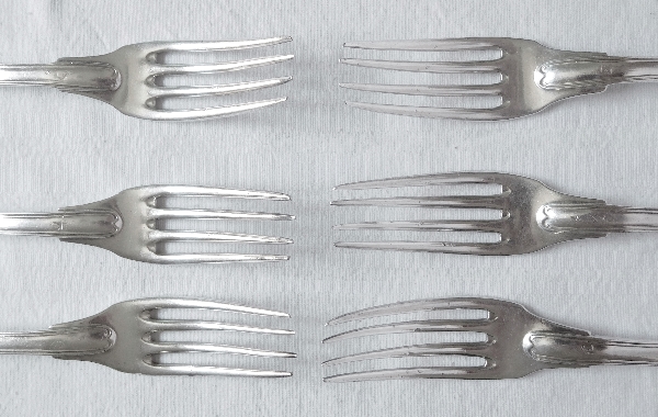 12 sterling silver table forks and spoons, early 19th century