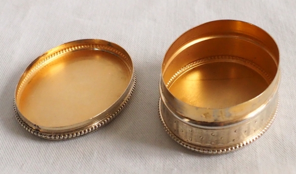 Sterling silver and vermeil pill box, late 19th century