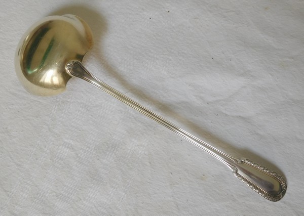 Puiforcat : sterling silver and vermeil cream ladle, Louis XVI style