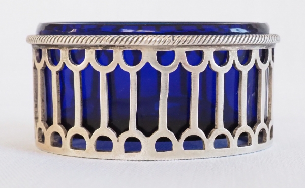 Pair of Louis XVI style sterling silver salt cellars and their blue glass