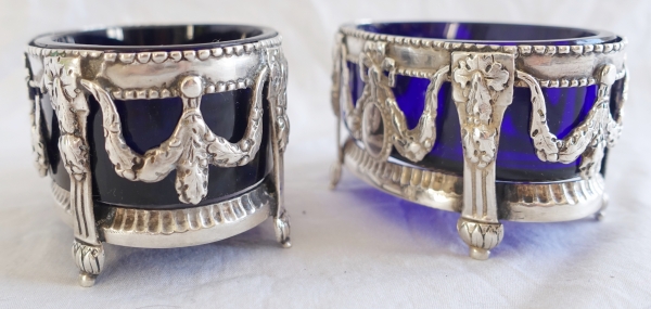 Pair of Louis XVI sterling silver and crystal salt cellars, 18th century