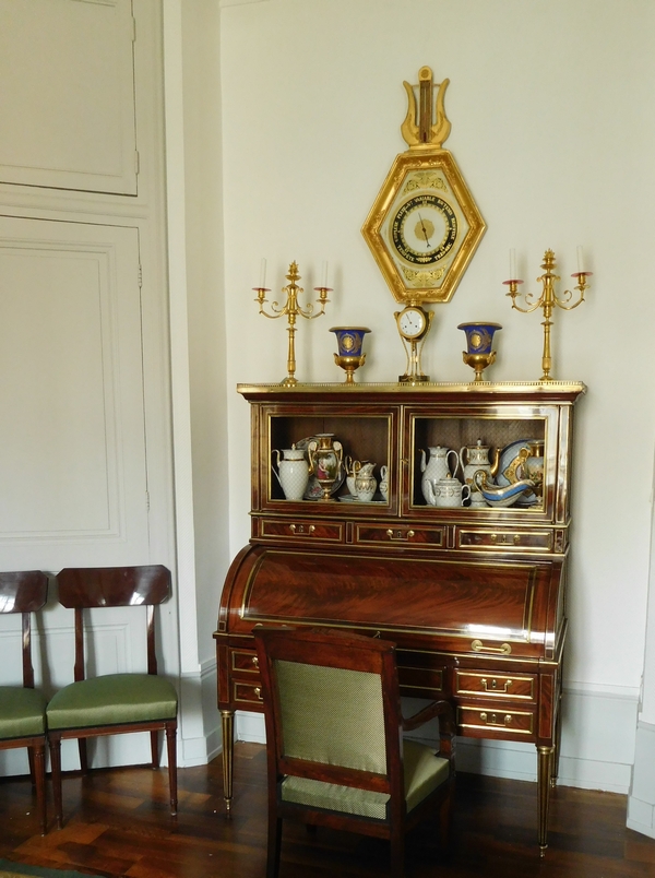 Empire barometer set into a carved and gilt wood frame - early 19th century