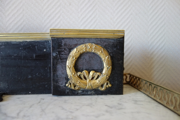 Empire patinated bronze and ormolu mantelbar, 19th century