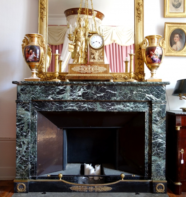 Empire patinated bronze and ormolu mantelbar, 19th century