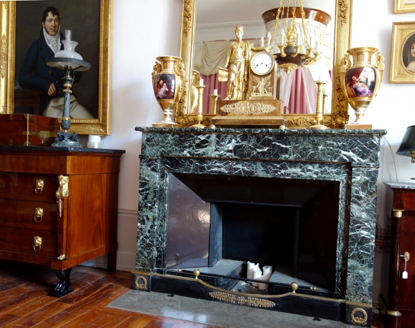 Empire patinated bronze and ormolu mantelbar, 19th century