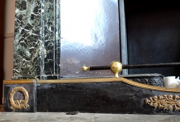 Empire patinated bronze and ormolu mantelbar, 19th century