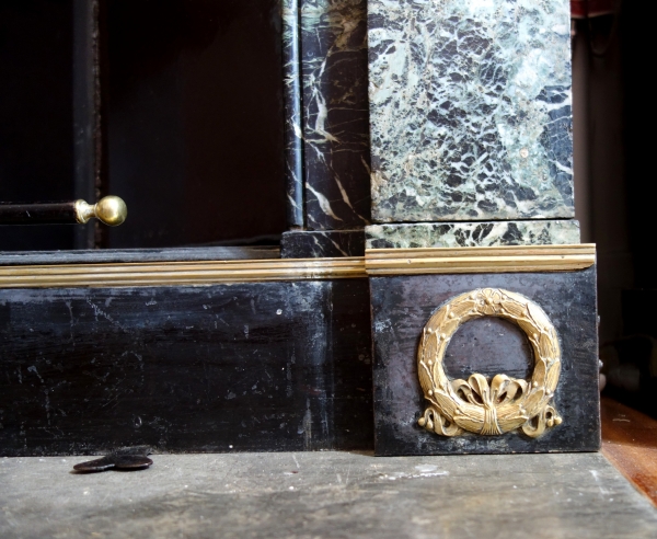 Empire patinated bronze and ormolu mantelbar, 19th century