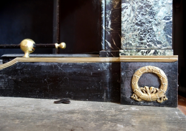 Empire patinated bronze and ormolu mantelbar, 19th century