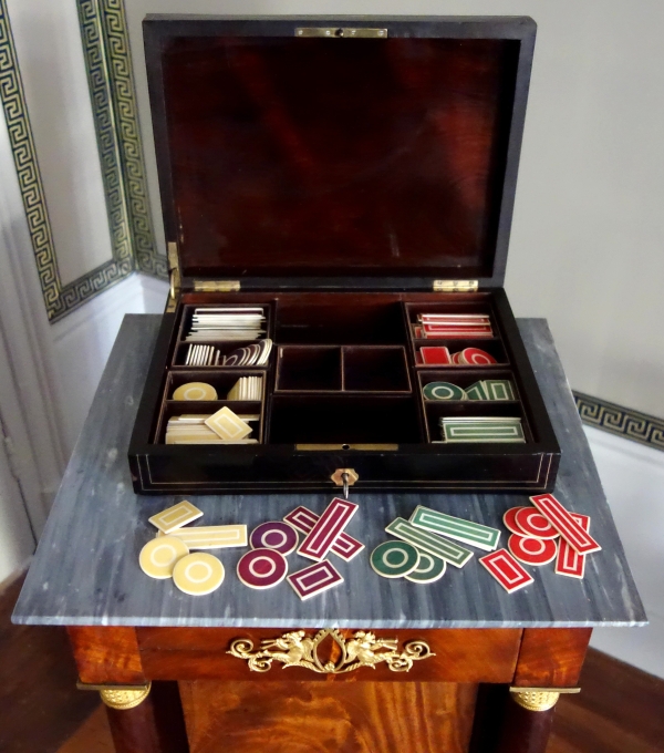 Napoleon III blackened wood, rosewood gambling box and coloured chips, Boulle marquetry