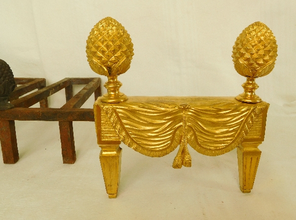 Pair of Louis XVI style ormolu andirons, mid 19th century