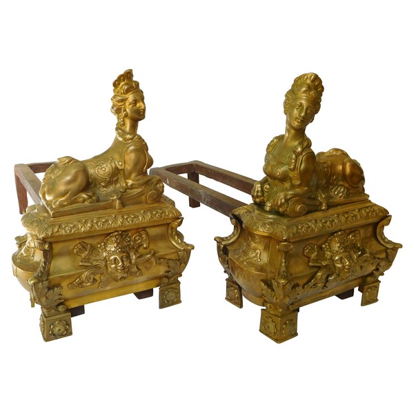 Pair of ormolu Regency style andirons, sphinge decoration, 19th century