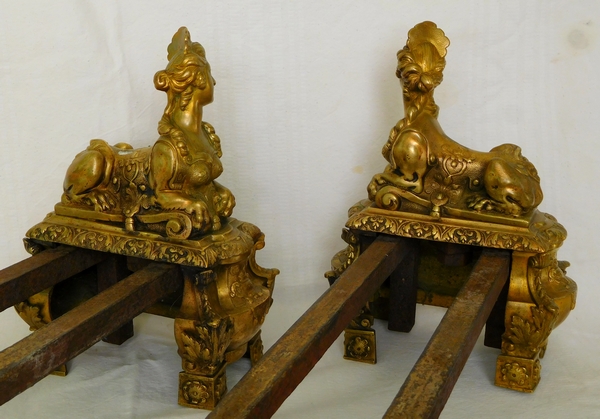 Pair of ormolu Regency style andirons, sphinge decoration, 19th century