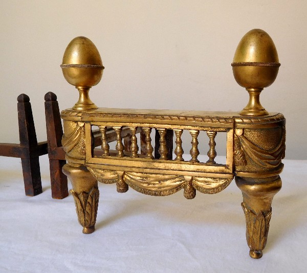 Pair of Louis XVI style ormolu andirons, mid 19th century