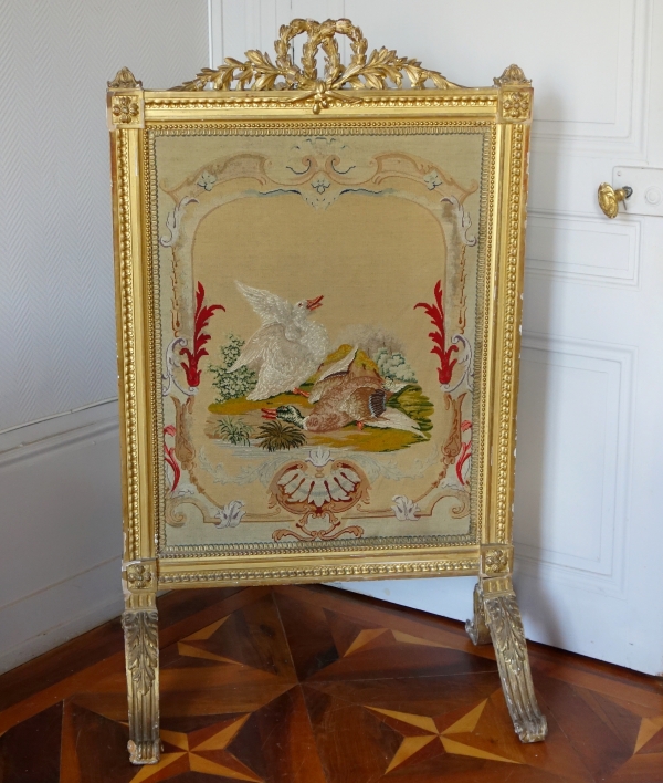 Pare-feu en bois doré de style Louis XVI