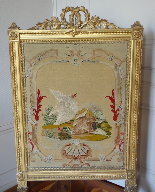 Louis XVI style gilt wood fire screen, 19th century