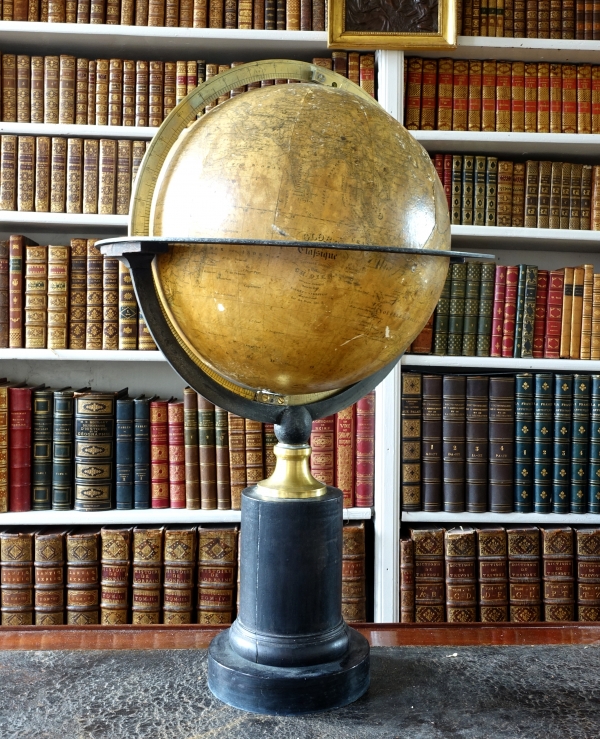 19th century globe on a blackened wood base circa 1850