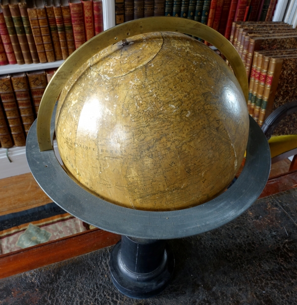 19th century globe on a blackened wood base circa 1850