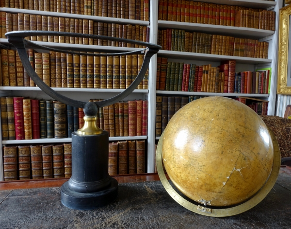 19th century globe on a blackened wood base circa 1850