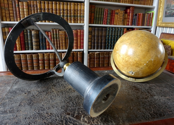 19th century globe on a blackened wood base circa 1850