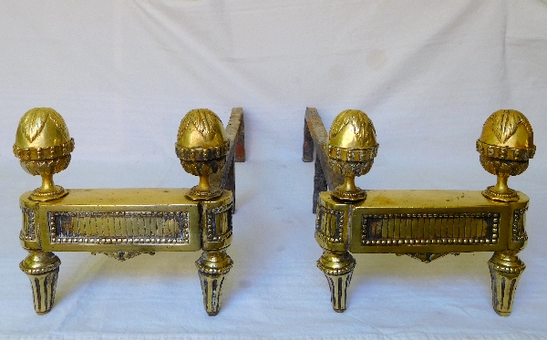 Pair of Louis XVI style bronze andirons, late 19th century