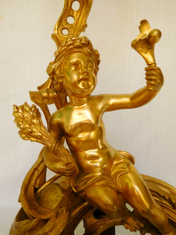 Paire de chenets en bronze doré aux putti, style Louis XV, milieu XIXe siècle