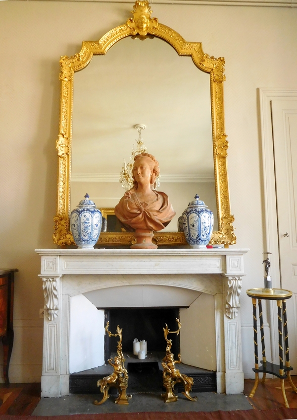 Pair of Louis XV style ormolu andirons, mid 19th century production