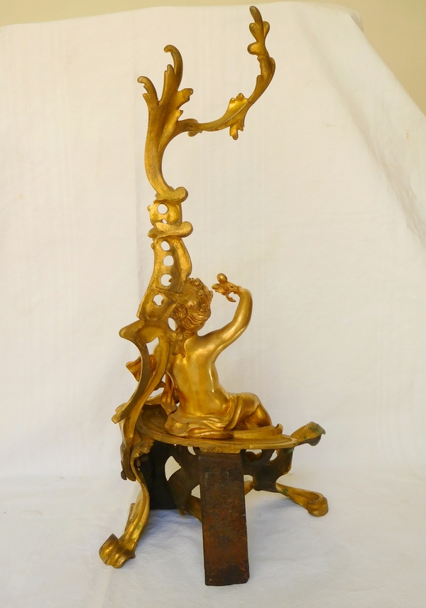 Pair of Louis XV style ormolu andirons, mid 19th century production