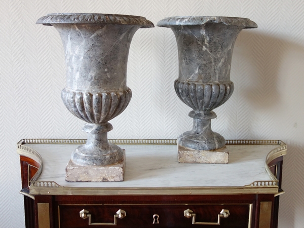 Pair of tall painted cast iron vases, 19th century