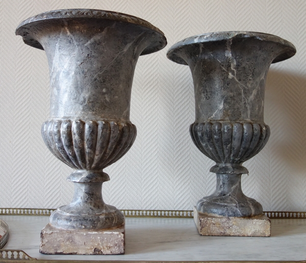 Pair of tall painted cast iron vases, 19th century