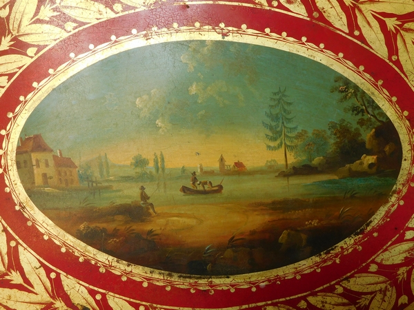Plateau en tôle peinte dorée rouge à décor de paysage, époque Empire Restauration