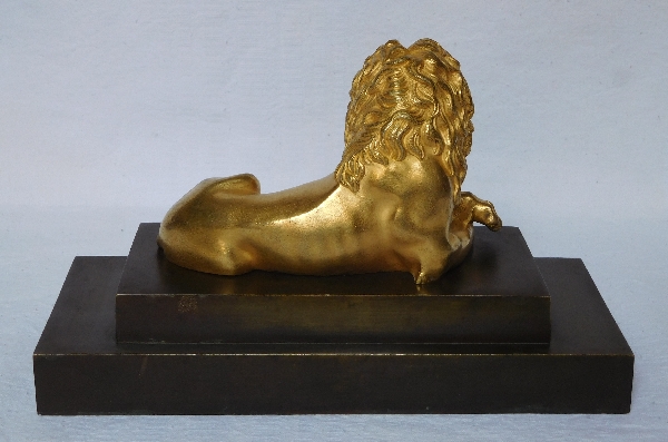 Large lion shaped ormolu paperweight, patinated bronze pedestal, Empire period - 19th century