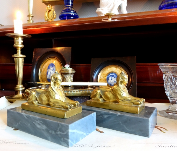 Pair of Empire blue marble and ormolu paperweights, early 19th century