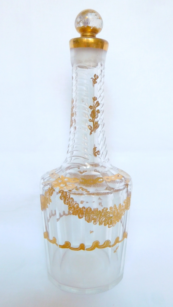 Louis XVI glass liquor bottle enhanced with fine gold, 18th century