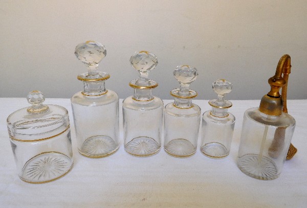 Flacon à parfum en cristal de Baccarat, cristal uni à fond étoile rehaussé de filets et étoiles dorés - 16cm