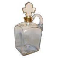 Flacon / carafe à whisky en cristal de Baccarat réhaussé à l'or fin, fleur de lys, vers 1900