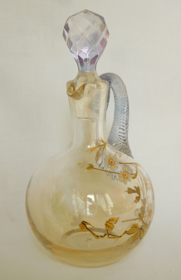 Small Baccarat iridescent crystal bottle enhanced with enamelled and gilt flowers decoration